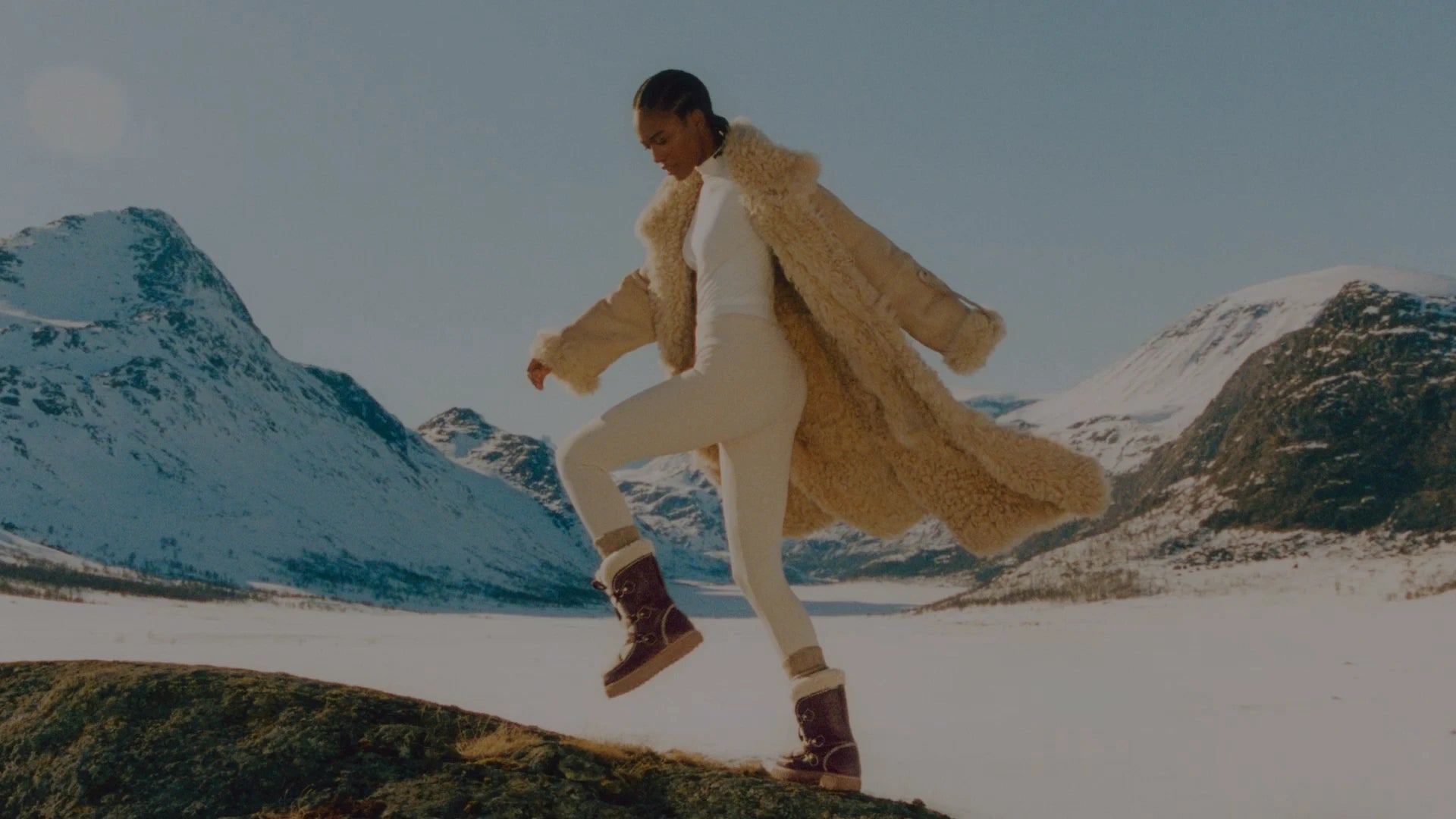 Seasonal SOREL boots in snow mountains